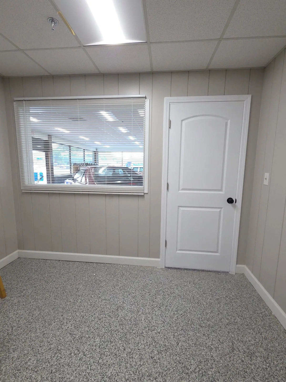 Commercial room remodel with fresh paint and drywall
