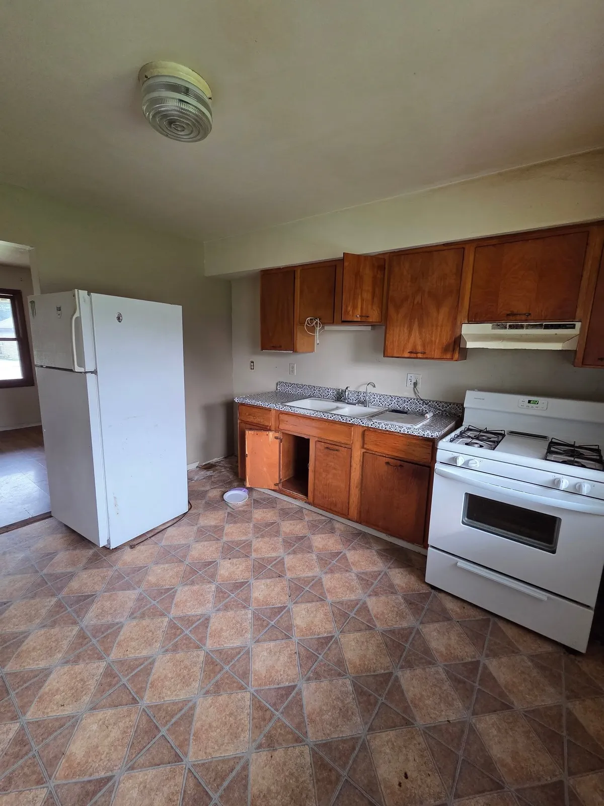 Kitchen with black cabinets before remodel