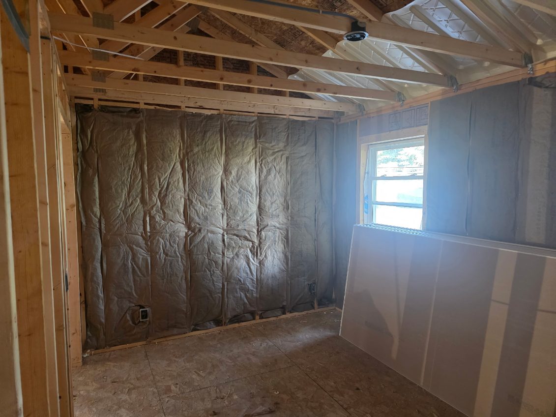 Bedroom window corner before drywall installation